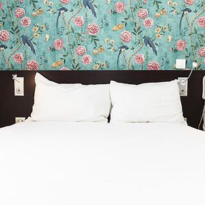 Kamer met een Queen Size Bed